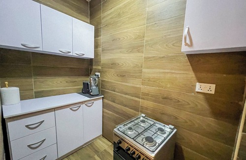 Accra Apartment | Cozy minimal suite 1-bedroom apartment with AC, WiFi in serene Accra