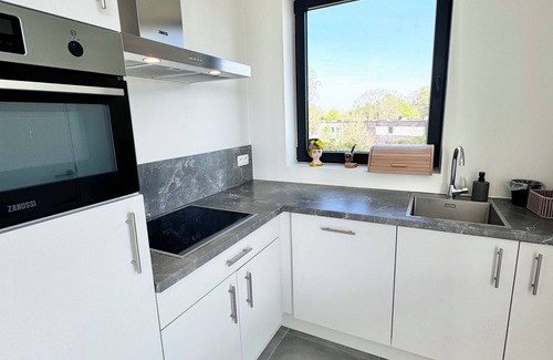 Astene Apartment | Cozy modern duplex with balcony in Astene