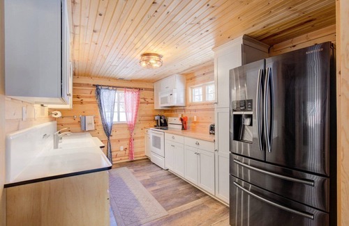 Clear Lake House | Cozy red cabin on Briggs Lake Chain w/boat house