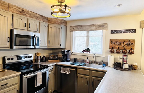 Lake Placid Condo | Cozy, relaxing condo overlooking Whiteface Club Resort near Jackrabbit trail.