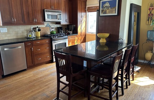 Huntington House | Cozy retreat with fenced in yard—centrally located in the heart of Long Island.