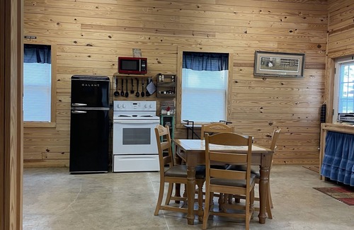 Gretna Cabin | Cozy retreat with lots of room for outdoor activities.