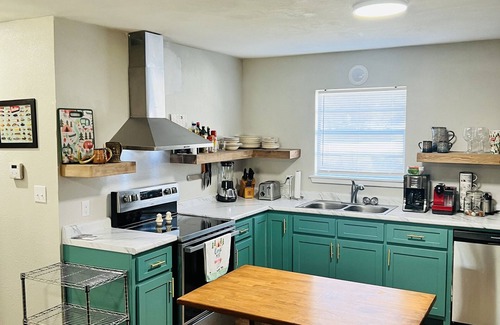 Wilburn Cabin | Cozy riverfront cabin with great outdoor space including a hot tub!