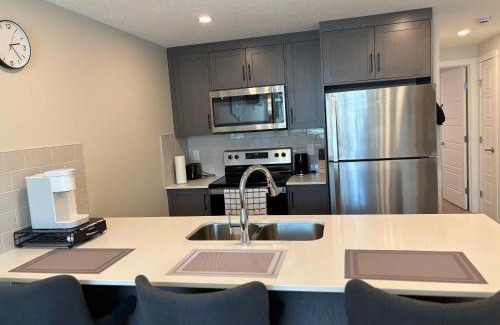 Calgary Apartment | Cozy & Stylish AC Suite Near YYC Airport