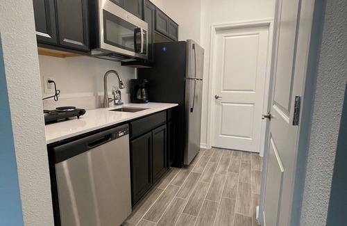 Haines City Apartment | Cozy Suites is near many theme parks, public golf clubs, beaches, and dining.