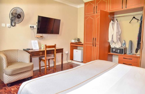 Muthaiga Hotel | Cozy Superior Room with AC & Fitness Access in Vibrant Nairobi