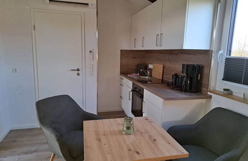 Lesumstotel House | Cozy tiny house with a view of the countryside