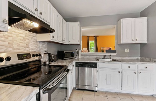 Fairland House | Cozy & Tranquil Getaway: Deck, Yard, Free Parking!