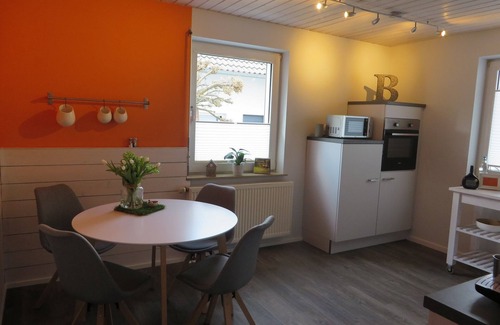 Grossheubach Apartment | Cozy vacation apartment (80 m2) with wooden terrace and sunbathing lawn