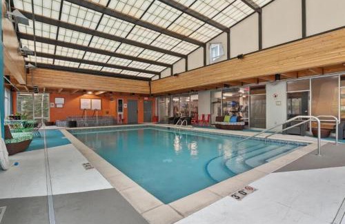 Mill District Apartment | CozySuites Mill District with pool, gym #06