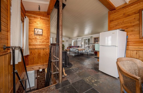 Bovey Apartment | Creative, Unique, Mini Carriage House Studio Tucked in the Woods on the shore of pristine Riley Lake