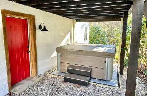 Frank House | Creekside cabin w/hot tub, fireplace & trail
