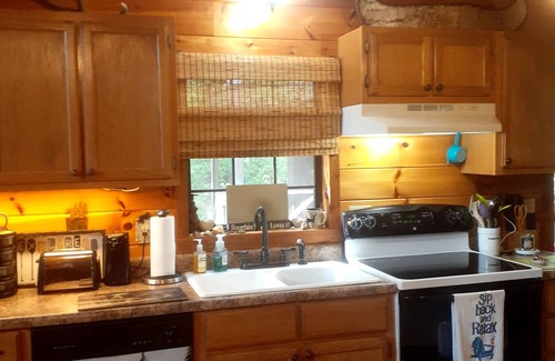 Westpoint Cabin | CreekView Cabin Retreat is Privately located on the Creek with a Jacuzzi & more