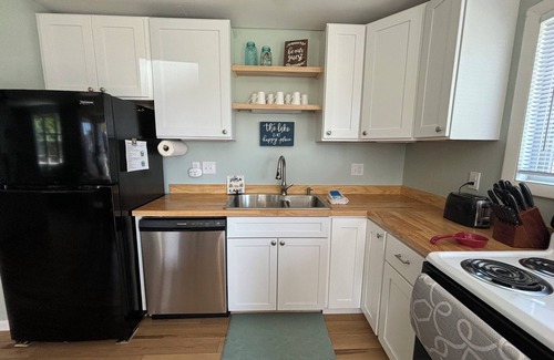 Oden Cottage | Crooked Lake Cottage with shared sandy beach and boat dock!