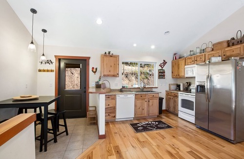 Ronald House | Custom home with balcony, radiant floor heating & washer/dryer