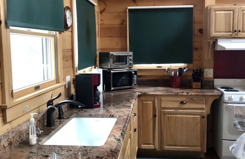 Bath House | Custom Log Cabin on Wild Ammonoosuc River