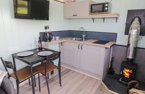 Rhyd-y-foel Cottage | CWTCH WINNIE SHEPHERDS HUT, pet friendly, with hot tub in Old Colwyn