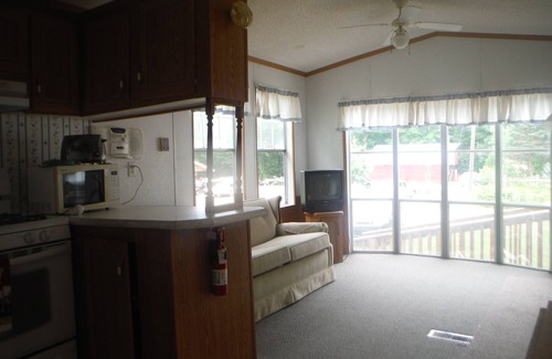 Curtis House | Darling Park Model Trailer downtown Curtis with views of South Manistique Lake