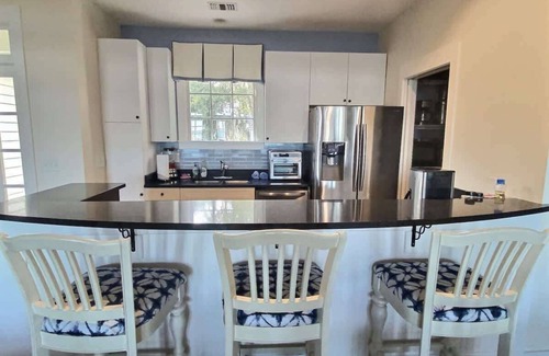 Melrose on the Beach House | Daufuskie Oceanfront Cottage with Golf Cart