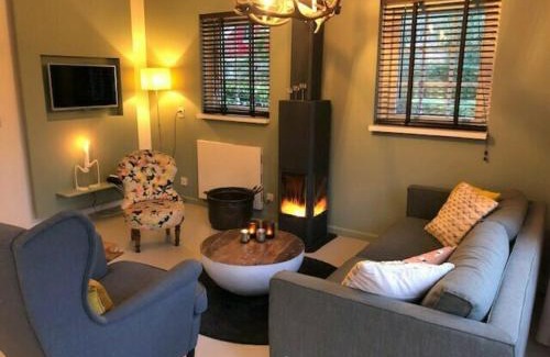 Lievelde House | De Brittenburg 4-persoons, finse sauna, hottub, sunshower, grote zonnige omheinde tuin, wifi en huisdier vriendelijk