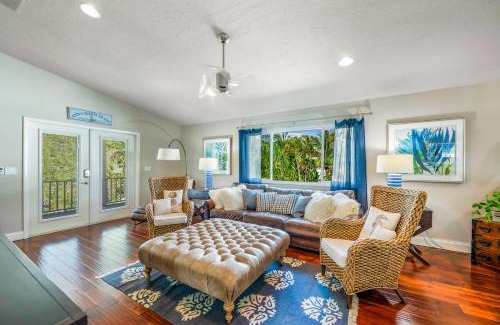Anna Maria House | Decked Out - Stunning Home Huge Sunny Resort Style Heated Pool Walk to Pine Ave Beach