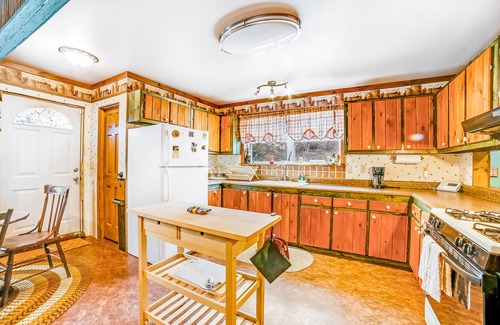 Indian Lake House | Delightful dog-friendly cabin with wood stove, firepit, deck, & mountain views
