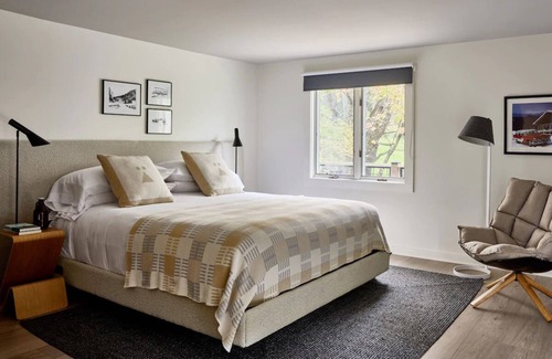 Stowe Area Hotel | Deluxe Riverside King w/Patio | Tälta Lodge, a Bluebird by Lark | River Access