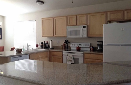 Springfield Lakes Reflection House | Desert Escape Vacation Rental