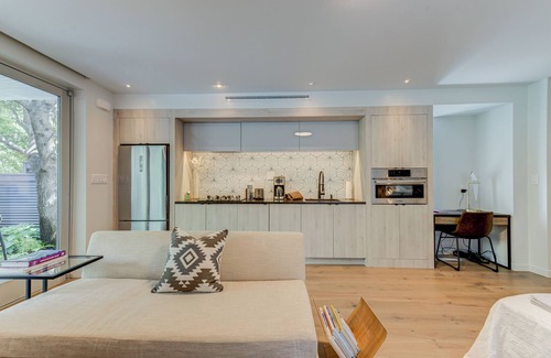 Inman Park House | Designer CityHome Terrace Level Garden unit with Hot Tub