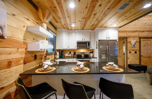 Pickens Cabin | Direct ATV trail access, covered patio with hot tub, and fire pit near Hochatown