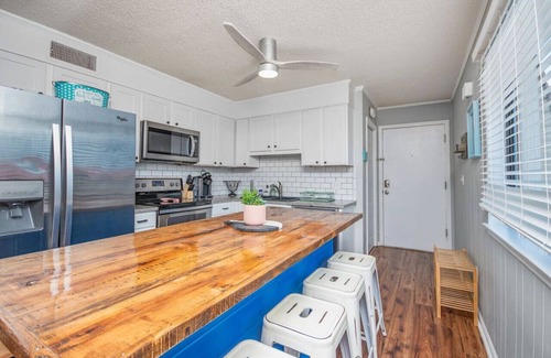 Ash Condo | Direct beach access! Beachfront Bliss with Pool & Modern Comforts!