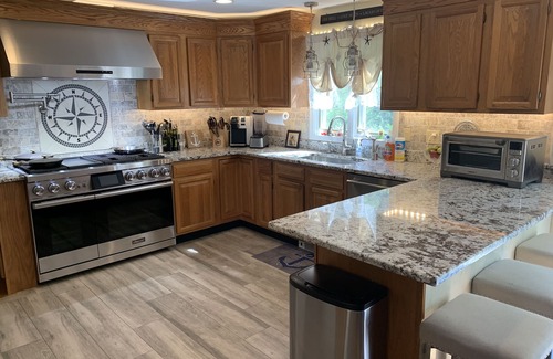 New Milford House | Direct Waterfront on Candlewood Lake with/boat slip/hot tub & outdoor kitchen