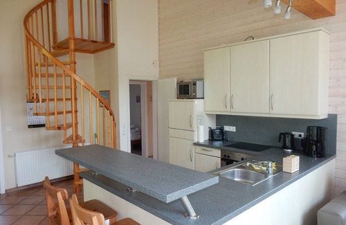 Norderteil House | Directly on the dike, a few minutes to the beach, canoeing, trampoline, swing, fireplace