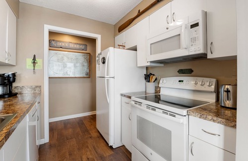 Manteo Condo | Dock Holiday: Canalfront condo, Water Views, Fisherman's dream with Boat Dock