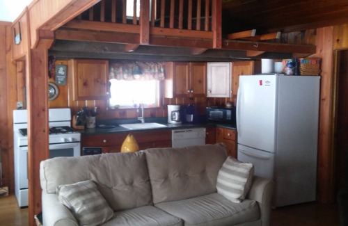 Piseco House | Dog friendly, fenced yard, sitting on the shore of Oxbow Lake