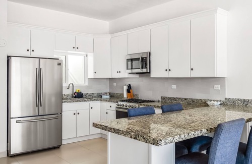 La Paloma Villa | Dog-friendly oceanfront villa with pool access, rooftop patio, full kitchen