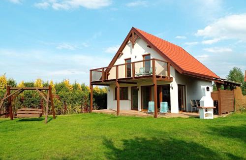 Ryn House | Dom z pięknymi widokami na jezioro ryńskie ilasy.
