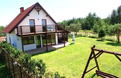 Ryn House | Dom z pięknymi widokami na jezioro ryńskie ilasy.