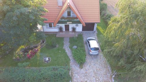 Guty House | Domek pod Klonami na Mazurach