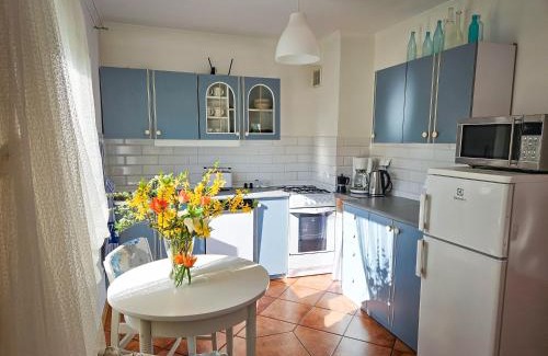 Guty House | Domek pod Klonami na Mazurach