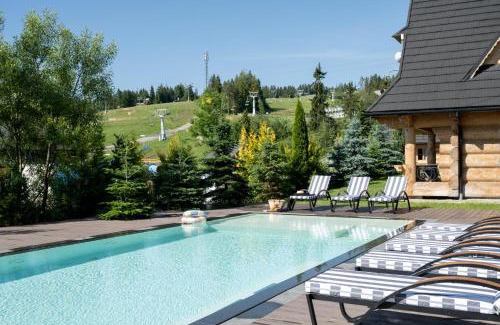 Bialka Tatrzanska Ski Chalet | Domki w Białce WOODHOUSE- Twój górski azyl przy stoku, z basenem i relaksem w saunie