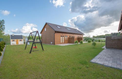 Grzybowo Resort | Domki w stylu góralskim Myśliwska 20