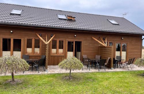 Grzybowo Resort | Domki w stylu góralskim Myśliwska 20
