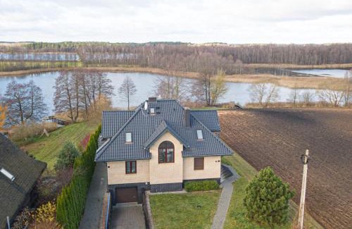 Krasnopol House | Domwigierski pl -Jeziorki -GR- Comfort-Ferienhaus-Polen - własna linia brzegowa i sauna