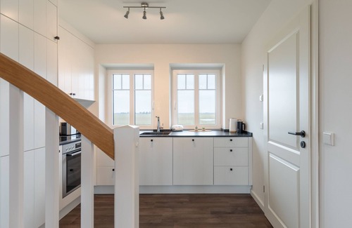 Suden Apartment | Doppelhaushälfte "tinkeltutenhus" auf Nordstrand für bis zu 4 Personen