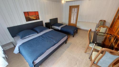 Salzatal House | Doppelzimmer 2 mit Aufbettung Erdgeschoß