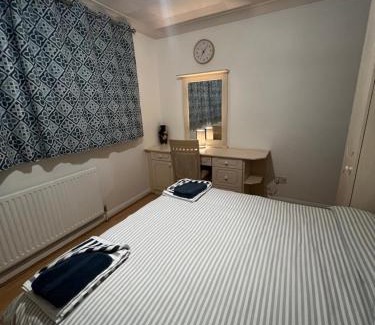 Kettering House | Double room at The Bungalow with shared shower room