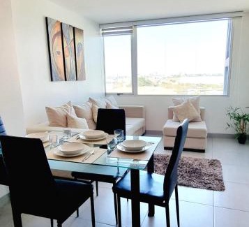 Simon Bolivar Apartment | Dpto cerca de Aeropuerto con piscina y zona de trabajo