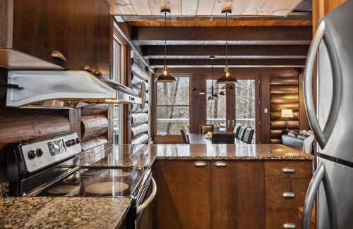 Lac-Superieur Ski Chalet | Dream Chalet with Spa & Fireplace – Lake Access, Pool & Sports Courts Included