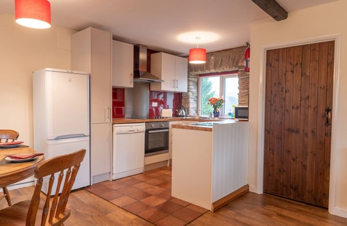Wheddon Cross Cottage | Dunkery Cottage is located in the heart of Exmoor National Park at Wheddon Cross. Dog friendly